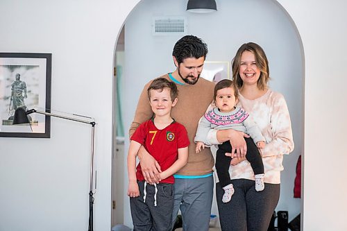 MIKAELA MACKENZIE / WINNIPEG FREE PRESS

Zeke Beilfuss (five, left), Rodrigo Beilfuss, Indira Beilfuss (nine months), and Elizabeth Holl pose for a portrait in their home in Winnipeg on Tuesday, March 30, 2021.  For Sarah story.

Winnipeg Free Press 2021