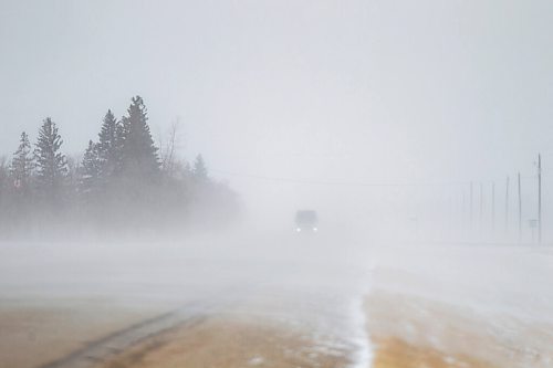 MIKAELA MACKENZIE / WINNIPEG FREE PRESS

Gusts of snow blow across highway 210 just east of Sant Adolphe on Tuesday, March 30, 2021.  Standup.

Winnipeg Free Press 2021