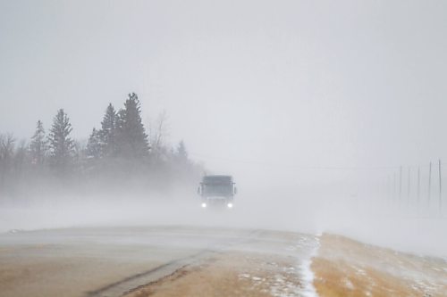 MIKAELA MACKENZIE / WINNIPEG FREE PRESS

Gusts of snow blow across highway 210 just east of Sant Adolphe on Tuesday, March 30, 2021.  Standup.

Winnipeg Free Press 2021