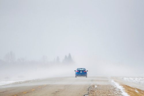 MIKAELA MACKENZIE / WINNIPEG FREE PRESS

Gusts of snow blow across highway 210 just east of Sant Adolphe on Tuesday, March 30, 2021.  Standup.

Winnipeg Free Press 2021