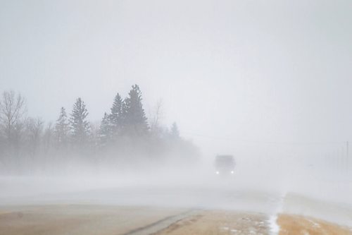 MIKAELA MACKENZIE / WINNIPEG FREE PRESS

Gusts of snow blow across highway 210 just east of Sant Adolphe on Tuesday, March 30, 2021.  Standup.

Winnipeg Free Press 2021