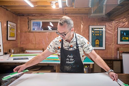 MIKAELA MACKENZIE / WINNIPEG FREE PRESS

Artist Eric Ouimet demonstrates the print-making process in his home studio in Grande Pointe on Tuesday, March 30, 2021.  For Dave Sanderson story.

Winnipeg Free Press 2021