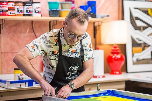 MIKAELA MACKENZIE / WINNIPEG FREE PRESS

Artist Eric Ouimet demonstrates the print-making process in his home studio in Grande Pointe on Tuesday, March 30, 2021.  For Dave Sanderson story.

Winnipeg Free Press 2021