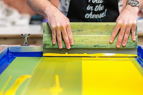 MIKAELA MACKENZIE / WINNIPEG FREE PRESS

Artist Eric Ouimet demonstrates the print-making process in his home studio in Grande Pointe on Tuesday, March 30, 2021.  For Dave Sanderson story.

Winnipeg Free Press 2021