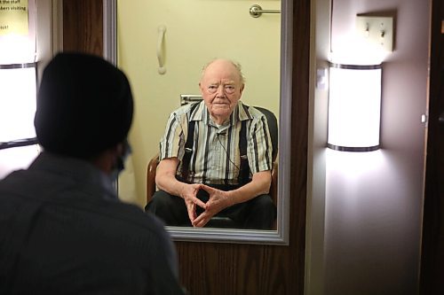 RUTH BONNEVILLE / WINNIPEG FREE PRESS 

local - Thorvaldson Care Centre

Photos of Ben during his interview with Gordon Boucher (94yrs), in booth.  

Ben interviews residents thru a makeshift glassed in booth to keep a safe separation, about how they feel about receiving the vaccine and their overall views of the future. 

Story:  Last year, I (Ben) interviewed a woman named Joyce Church, a resident at the Thorvaldson Care Centre in Osborne Village. She said that things would get better as long as we hang in there and do the right thing by staying apart. Today, (Tuesday) all 65 residents at the centre are receiving their second dose of the Pfizer vaccine, and the centre made it through one whole year with zero cases of COVID-19.

Story to run in Saturdays paper.

Reporter; ben Waldman

March 30 ,2021
