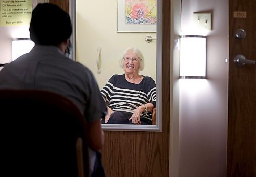 RUTH BONNEVILLE / WINNIPEG FREE PRESS 

local - Thorvaldson Care Centre

Photos of Ben during his interview with Joan Guttormisson, in booth.  

Ben interviews residents thru a makeshift glassed in booth to keep a safe separation, about how they feel about receiving the vaccine and their overall views of the future. 

Story:  Last year, I (Ben) interviewed a woman named Joyce Church, a resident at the Thorvaldson Care Centre in Osborne Village. She said that things would get better as long as we hang in there and do the right thing by staying apart. Today, (Tuesday) all 65 residents at the centre are receiving their second dose of the Pfizer vaccine, and the centre made it through one whole year with zero cases of COVID-19.

Story to run in Saturdays paper.

Reporter; ben Waldman

March 30 ,2021
