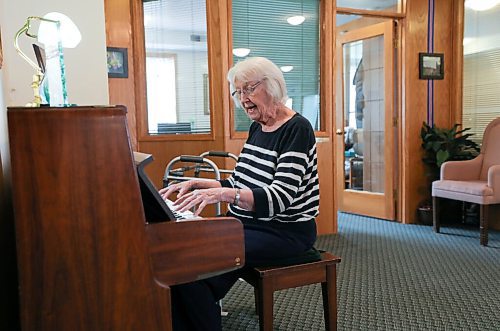 RUTH BONNEVILLE / WINNIPEG FREE PRESS 

local - Thorvaldson Care Centre

Photo of resident Joan Guttormisson, playing the piano for guests at centre. 

Ben interviews residents thru a makeshift glassed in booth to keep a safe separation, about how they feel about receiving the vaccine and their overall views of the future. 

Story:  Last year, I (Ben) interviewed a woman named Joyce Church, a resident at the Thorvaldson Care Centre in Osborne Village. She said that things would get better as long as we hang in there and do the right thing by staying apart. Today, (Tuesday) all 65 residents at the centre are receiving their second dose of the Pfizer vaccine, and the centre made it through one whole year with zero cases of COVID-19.

Story to run in Saturdays paper.

Reporter; ben Waldman

March 30 ,2021
