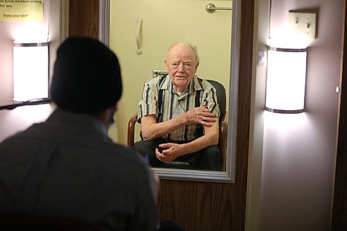 RUTH BONNEVILLE / WINNIPEG FREE PRESS 

local - Thorvaldson Care Centre

Photos of Ben during his interview with Gordon Boucher (94yrs), in booth.  

Ben interviews residents thru a makeshift glassed in booth to keep a safe separation, about how they feel about receiving the vaccine and their overall views of the future. 

Story:  Last year, I (Ben) interviewed a woman named Joyce Church, a resident at the Thorvaldson Care Centre in Osborne Village. She said that things would get better as long as we hang in there and do the right thing by staying apart. Today, (Tuesday) all 65 residents at the centre are receiving their second dose of the Pfizer vaccine, and the centre made it through one whole year with zero cases of COVID-19.

Story to run in Saturdays paper.

Reporter; ben Waldman

March 30 ,2021
