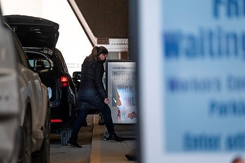 Daniel Crump / Winnipeg Free Press. People come and go from the RBC Convention Centre downtown as they get their COVID-19 vaccinations Wednesday afternoon. March 31, 2021.