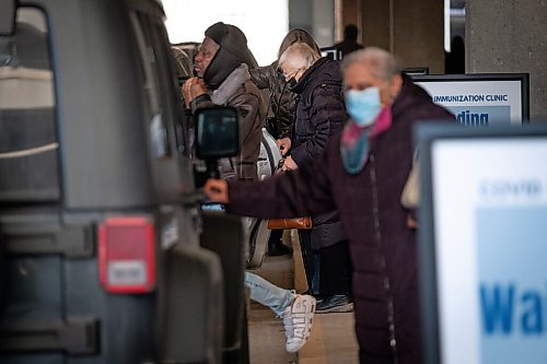 Daniel Crump / Winnipeg Free Press. People come and go from the RBC Convention Centre downtown as they get their COVID-19 vaccinations Wednesday afternoon. March 31, 2021.