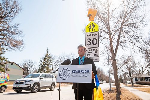 MIKE SUDOMA / WINNIPEG FREE PRESS 
City Councillor for Charleswood, Tuxedo, and Westwood, Kevin Klein, talks to media Thursday as he unveils the first of many blinking amber traffic light that will be added to the 30km/h school zone signs to give more visibility in highly ticketed areas
April 1, 2021