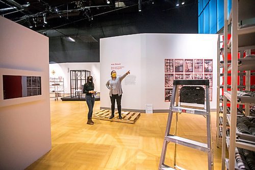 MIKAELA MACKENZIE / WINNIPEG FREE PRESS

Project manager Anja Studer (left) and conservation technician Stephanie Chipilski discuss Aida ehovic's piece, TO TE NEMA (Why Are You Not Here), in the new Artivism exhibit at the Canadian Museum for Human Rights in Winnipeg on Thursday, April 1, 2021. This art installation, made in response to the Srebrenica genocide in Bosnia and Herzegovina, is made up of 8,372 small coffee cups (for the 8,372 Bosnian Muslims who died). Standup.

Winnipeg Free Press 2021