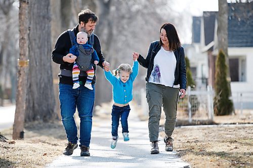 JOHN WOODS / WINNIPEG FREE PRESS
Rebecca and Aarron Foat walk with their children Emilia and Edward outside their home in Winnipeg Thursday, April 1, 2021. Foat is a full-time mom and gave birth to Edward in late October. Many of her acquaintances she didn't expect to hear from stepped up to help her over the past few months.

Reporter: Declan