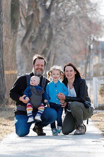 JOHN WOODS / WINNIPEG FREE PRESS
Rebecca and Aarron Foat walk with their children Emilia and Edward outside their home in Winnipeg Thursday, April 1, 2021. Foat is a full-time mom and gave birth to Edward in late October. Many of her acquaintances she didn't expect to hear from stepped up to help her over the past few months.

Reporter: Declan
