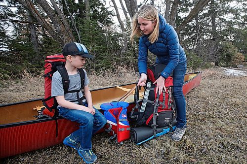JOHN WOODS / WINNIPEG FREE PRESS
Megan Maxwell and her son Holden, 10, prepare their camping gear for the upcoming season at their home near Birds Hill Park Monday, April 5, 2021. Maxwell was kicked out of the provincial camping site booking website after waiting for hours in line.

Reporter: McIntosh