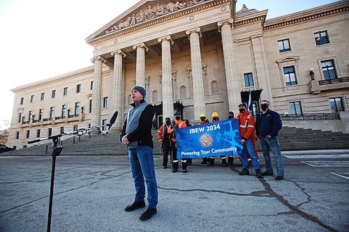 MIKE DEAL / WINNIPEG FREE PRESS
Manitoba Hydro workers with the IBEW Local 2034 gather at foot to the steps in front of the Manitoba Legislative building early Tuesday morning asking the government to step aside so they can negotiate with Manitoba Hydro without interference. 
IBEW 2034 business manager, Mike Espenell made a statement. 
210406 - Tuesday, April 6, 2021.