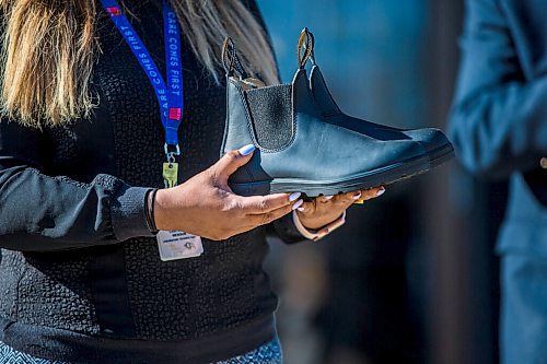 MIKAELA MACKENZIE / WINNIPEG FREE PRESS

Laboratory technician Chaturika Jayawardanamake holds a pair of shoes at a budget announcement at Cadham Provincial Laboratory in Winnipeg on Tuesday, April 6, 2021. For Carol Sanders story.

Winnipeg Free Press 2021