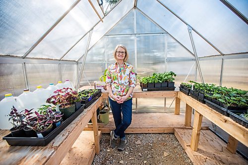 MIKAELA MACKENZIE / WINNIPEG FREE PRESS

Gardener Janet Epp, who uses a coconut coir mix instead of peat to start her seedlings, poses for a portrait in her greenhouse in Winnipeg on Tuesday, April 6, 2021. For Sarah Lawrynuik story.

Winnipeg Free Press 2021