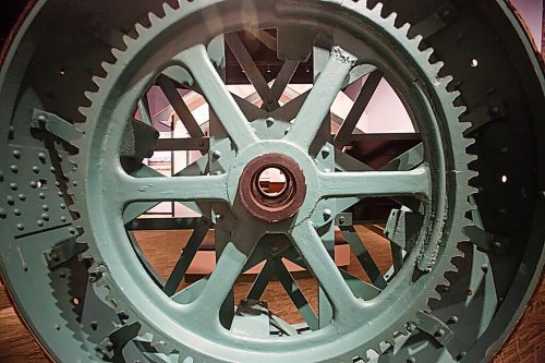 MIKE DEAL / WINNIPEG FREE PRESS
The Manitoba Museum opened a revitalized Prairies Gallery Wednesday morning. 
A large steam tractor wheel from the late 1800s on display in the Prairies Gallery.
210407 - Wednesday, April 07, 2021.