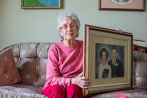 MIKAELA MACKENZIE / WINNIPEG FREE PRESS

Ruth Schroeder poses for a portrait with a wedding photo at her home in Morris on Thursday, April 8, 2021. John and Ruth Schroeder have been married for 76 years. For Jen Zoratti story.

Winnipeg Free Press 2021