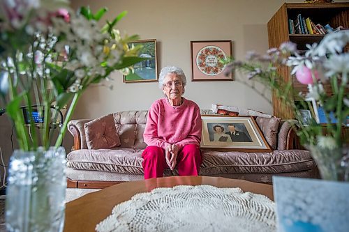 MIKAELA MACKENZIE / WINNIPEG FREE PRESS

Ruth Schroeder poses for a portrait with a wedding photo and anniversary flowers at her home in Morris on Thursday, April 8, 2021. John and Ruth Schroeder have been married for 76 years. For Jen Zoratti story.

Winnipeg Free Press 2021