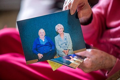 MIKAELA MACKENZIE / WINNIPEG FREE PRESS

Ruth Schroeder poses for a portrait with a photo from their 60th anniversary at her home in Morris on Thursday, April 8, 2021. John and Ruth Schroeder have been married for 76 years. For Jen Zoratti story.

Winnipeg Free Press 2021