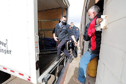 RUTH BONNEVILLE / WINNIPEG FREE PRESS 

Standup - Fire Equipment donation 

Off duty WFPS personal  load decommissioned air tanks into a moving truck at the Winnipeg Fire Paramedic Service Training Academy,Friday. 

WFPS  loads a trailer-load of donations to Firefighters Without Borders Canada and the local moving company Two Small Men with Big Hearts Moving has donated the transport of the gear from Winnipeg to Vancouver, where it will then be shipped overseas. Winnipeg Fire Paramedic Service Training Academy,


The WFPS follows the National Fire Protection Associations standards which stipulate firefighting personal protective gear (helmets, turn-out gear, etc.) be decommissioned after 10 years of use. Often, decommissioned gear is still in good usable condition.

In an effort to assist others, and keep these goods out of landfills, the WFPS donates newly decommissioned gear that is still in good usable condition to Firefighters Without Borders (FWB Canada). The non-profit organization, based in Vancouver, sends these goods to developing countries around the world where firefighters do not have access to, or the means to obtain safe gear.


April 9th,  2021