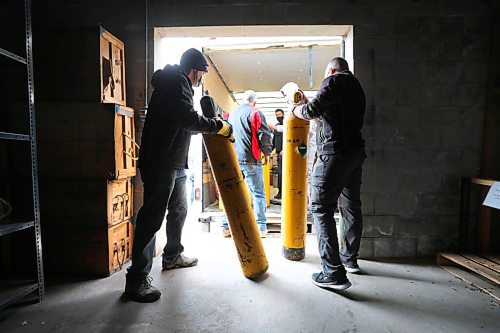 RUTH BONNEVILLE / WINNIPEG FREE PRESS 

Standup - Fire Equipment donation 

Off duty WFPS personal  load decommissioned air tanks into a moving truck at the Winnipeg Fire Paramedic Service Training Academy,Friday. 

WFPS  loads a trailer-load of donations to Firefighters Without Borders Canada and the local moving company Two Small Men with Big Hearts Moving has donated the transport of the gear from Winnipeg to Vancouver, where it will then be shipped overseas. Winnipeg Fire Paramedic Service Training Academy,


The WFPS follows the National Fire Protection Associations standards which stipulate firefighting personal protective gear (helmets, turn-out gear, etc.) be decommissioned after 10 years of use. Often, decommissioned gear is still in good usable condition.

In an effort to assist others, and keep these goods out of landfills, the WFPS donates newly decommissioned gear that is still in good usable condition to Firefighters Without Borders (FWB Canada). The non-profit organization, based in Vancouver, sends these goods to developing countries around the world where firefighters do not have access to, or the means to obtain safe gear.


April 9th,  2021