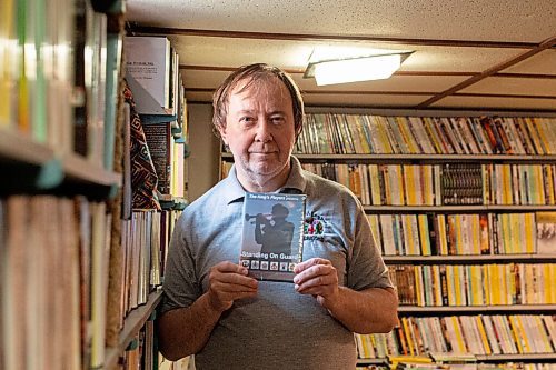 MIKE SUDOMA / WINNIPEG FREE PRESS  
Local actor/filmmaker, Ted Wynne,shows off a copy of his film, Standing on Guard in his basement movie room Friday. Wynne spent some time at Buckingham Palace he had the chance to work with Prince Charles and the late Prince Philip, Duke of Edinburgh during the making of his film
April 9, 2021