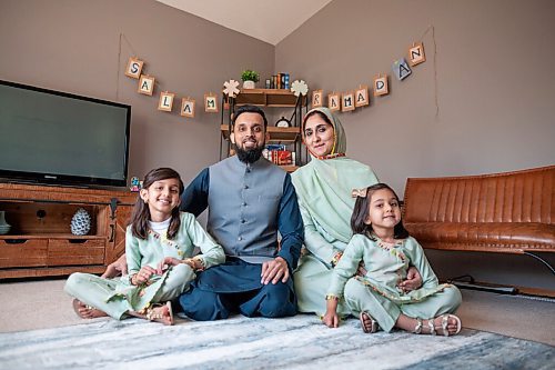 Daniel Crump / Winnipeg Free Press. (L to R) Ayza Waleed, Waleed Waleed, Asra Waleed and Sarah Waleed sit in front of their decorated ramadan corner in their living room. April 10, 2021.