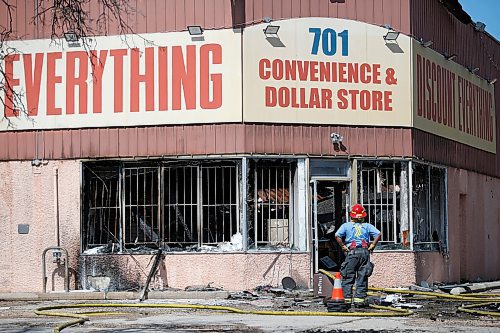 JOHN WOODS / WINNIPEG FREE PRESS
Firefighters work to extinguish a fire at Discount Everything on Ellice Avenue in Winnipeg Sunday, April 11, 2021. 

Reporter: ?