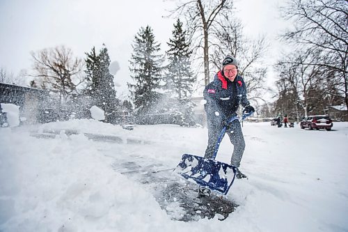 MIKAELA MACKENZIE / WINNIPEG FREE PRESS


Colin Dennis shovels his parent's driveway clear of the wet, heavy spring snow in Winnipeg on Tuesday, April 13, 2021.
Winnipeg Free Press 2020.