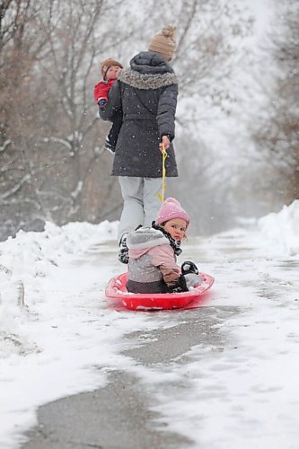 RUTH BONNEVILLE / WINNIPEG FREE PRESS 

Weather Standup -  Toboggan ride

Jodi Schellenberg takes her two young children, Ellie - 2 years and her little brother.  Leo - 8 months, out for a toboggan ride along a walkway nest to Windsor Park Golf Course Tuesday.


April 13,  2021