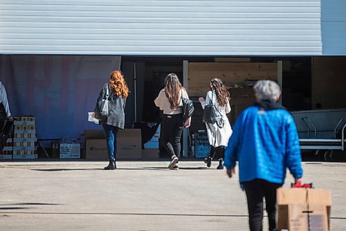 MIKAELA MACKENZIE / WINNIPEG FREE PRESS

Vendors set up for the Third+Bird spring market at the Red River Exhibition in Winnipeg on Friday, April 16, 2021. For Temur Durrani story.
Winnipeg Free Press 2020.