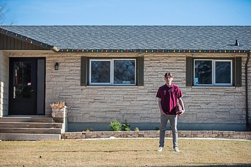 MIKAELA MACKENZIE / WINNIPEG FREE PRESS

Anthony Zarow, a quarterback out of St. Paul's who decided to move on from football because of COVID-19, poses for a portrait at his home in St. Andrew's on Friday, April 16, 2021. For Taylor Allen story.
Winnipeg Free Press 2020.