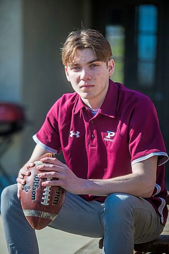 MIKAELA MACKENZIE / WINNIPEG FREE PRESS

Anthony Zarow, a quarterback out of St. Paul's who decided to move on from football because of COVID-19, poses for a portrait at his home in St. Andrew's on Friday, April 16, 2021. For Taylor Allen story.
Winnipeg Free Press 2020.