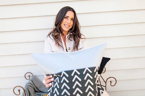 Daniel Crump / Winnipeg Free Press. Chelsey Palmer, owner of Jagged Little Pillows, a home decor business based in Swan River. For five years Palmer has been turning out all manner of home decor, from pillows, mats, stemware, and more recently masks. April 17, 2021.