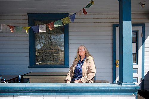 MIKE DEAL / WINNIPEG FREE PRESS
Writes of Spring poet, Carolyn Hoople Creed, on the front porch of her son's house where she would go to find peace during the pandemic. 
Carolyn Hoople Creed is a poet and Associate Professor at University College of the North.
210417 - Saturday, April 17, 2021.
