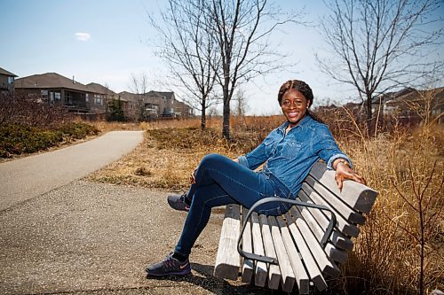 MIKE DEAL / WINNIPEG FREE PRESS
Writes of Spring poet, Alero Tenumah, in Ken Oblik Greenway Park, a place where she would go to get fresh air and take time to find peace during the pandemic. 
Alero Tenumah immigrated to Canada over 10 years ago and now calls Manitoba home.
210417 - Saturday, April 17, 2021.