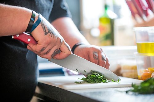 MIKAELA MACKENZIE / WINNIPEG FREE PRESS

Ashley Hebel, head chef at Frenchway Cafe on Corydon, makes Pasta Aglio et olio with Gamberi in Winnipeg on Monday, April 19, 2021. For Eva Wasney story.
Winnipeg Free Press 2020.