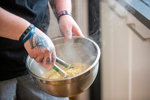 MIKAELA MACKENZIE / WINNIPEG FREE PRESS

Ashley Hebel, head chef at Frenchway Cafe on Corydon, makes Pasta Aglio et olio with Gamberi in Winnipeg on Monday, April 19, 2021. For Eva Wasney story.
Winnipeg Free Press 2020.