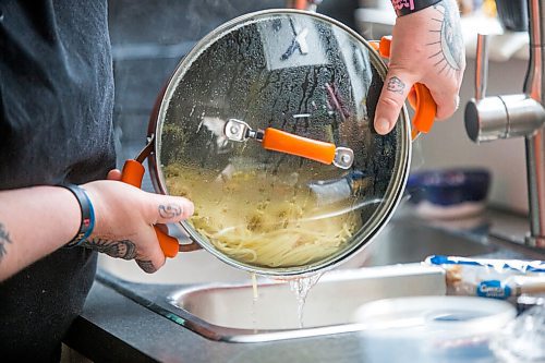 MIKAELA MACKENZIE / WINNIPEG FREE PRESS

Ashley Hebel, head chef at Frenchway Cafe on Corydon, makes Pasta Aglio et olio with Gamberi in Winnipeg on Monday, April 19, 2021. For Eva Wasney story.
Winnipeg Free Press 2020.