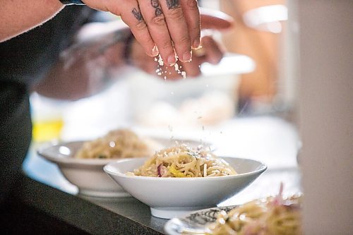 MIKAELA MACKENZIE / WINNIPEG FREE PRESS

Ashley Hebel, head chef at Frenchway Cafe on Corydon, makes Pasta Aglio et olio with Gamberi in Winnipeg on Monday, April 19, 2021. For Eva Wasney story.
Winnipeg Free Press 2020.