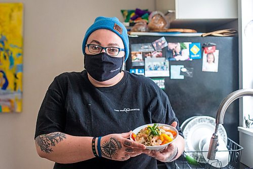 MIKAELA MACKENZIE / WINNIPEG FREE PRESS

Ashley Hebel, head chef at Frenchway Cafe on Corydon, poses for a portrait with a bowl of Pasta Aglio et olio with Gamberi in Winnipeg on Monday, April 19, 2021. For Eva Wasney story.
Winnipeg Free Press 2020.