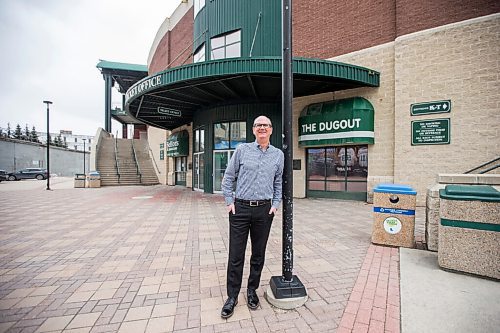MIKAELA MACKENZIE / WINNIPEG FREE PRESS

Andrew Collier, Goldeyes general manager who just booked his vaccine for tomorrow, poses for a portrait in front of the stadium in Winnipeg on Monday, April 19, 2021. For --- story.
Winnipeg Free Press 2020.
