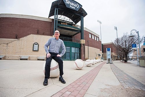 MIKAELA MACKENZIE / WINNIPEG FREE PRESS

Andrew Collier, Goldeyes general manager who just booked his vaccine for tomorrow, poses for a portrait in front of the stadium in Winnipeg on Monday, April 19, 2021. For --- story.
Winnipeg Free Press 2020.