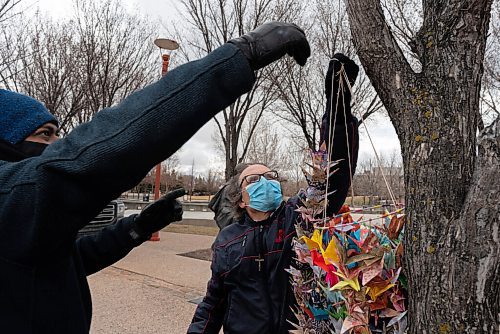 JESSE BOILY  / WINNIPEG FREE PRESS
A group of about 10 walked at the prayer walk for the people of Myanmar outside the Upper Fort Gary gates to the Human Rights Museum on Tuesday. Participants hung a thousand origami cranes in a tree as a symbol of hope for the people of Myanmar. Tuesday, April 20, 2021.
Reporter: Standup