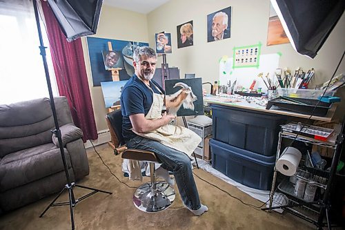 MIKAELA MACKENZIE / WINNIPEG FREE PRESS

JD Hawk, one local artist who has dipped his art in the waters of the burgeoning NFT art space, poses for a portrait at his home studio area with one of the original paintings that has now been minted as an NFT in Winnipeg on Tuesday, April 20, 2021. For Joel Schlesinger story.
Winnipeg Free Press 2020.