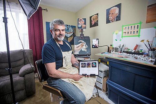 MIKAELA MACKENZIE / WINNIPEG FREE PRESS

JD Hawk, one local artist who has dipped his art in the waters of the burgeoning NFT art space, poses for a portrait at his home studio area in Winnipeg on Tuesday, April 20, 2021. For Joel Schlesinger story.
Winnipeg Free Press 2020.