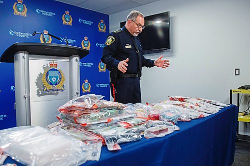 MIKE DEAL / WINNIPEG FREE PRESS
During a press conference at Winnipeg Police HQ, Winnipeg Police Constable Rob Carver, Public Information Officer, announces that the Drug Enforcement Unit have seized property, cash, jewelry, cocaine and crack cocaine along with other items during the arrest of 26 people in a months long investigation they are calling Project Matriarch.
210420 - Tuesday, April 20, 2021.
